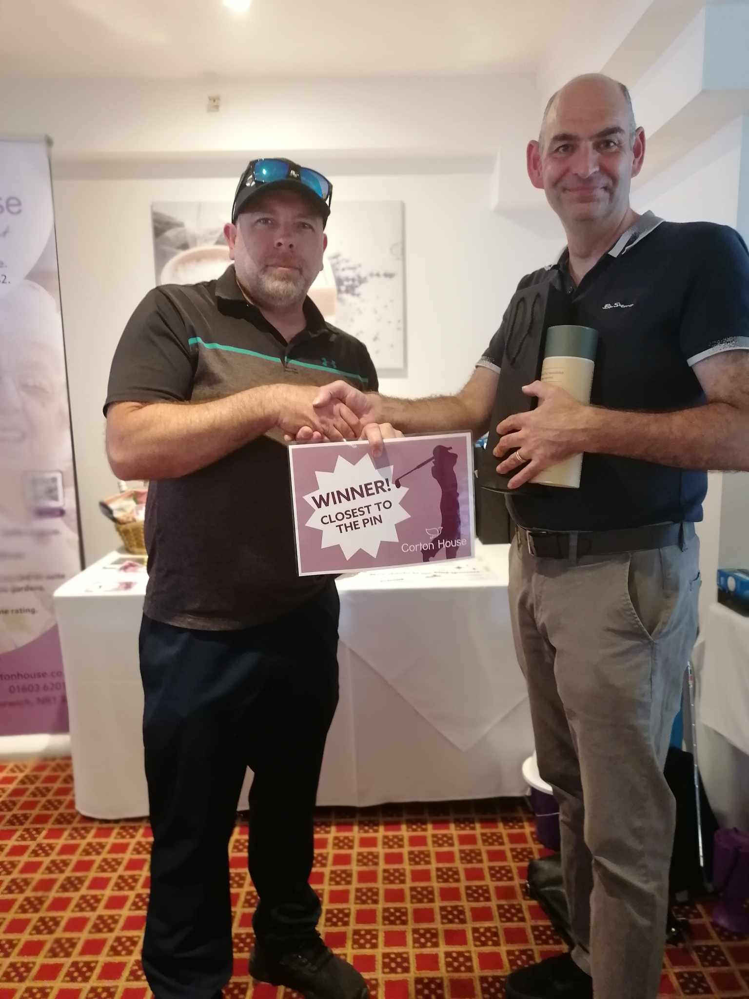 A prize presentation at the charity golf day