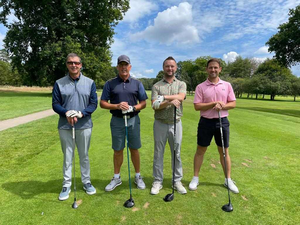 Smiling golfers at Corton House golf day