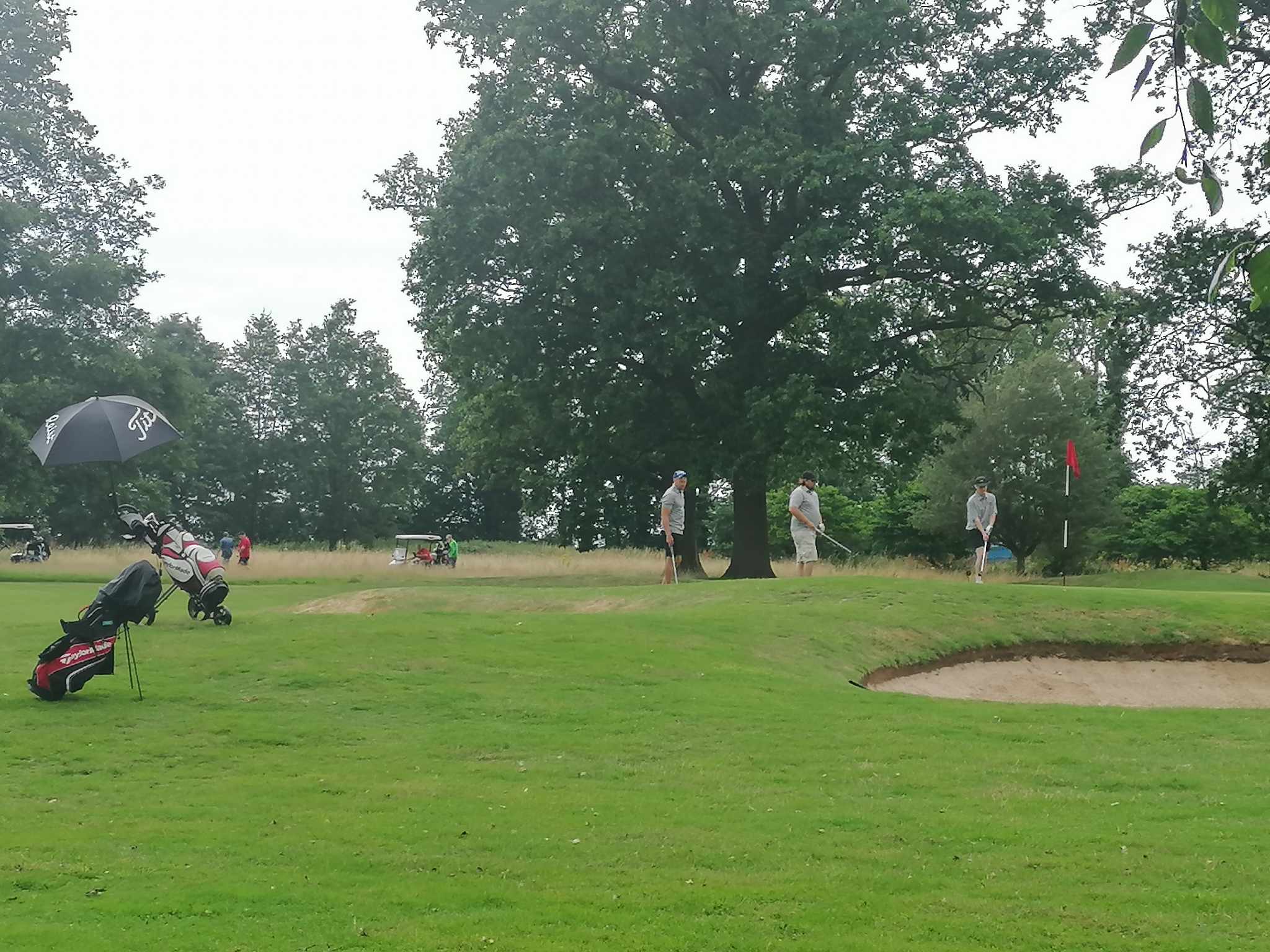 A rainy day at the golf course but spirits were not dampened.