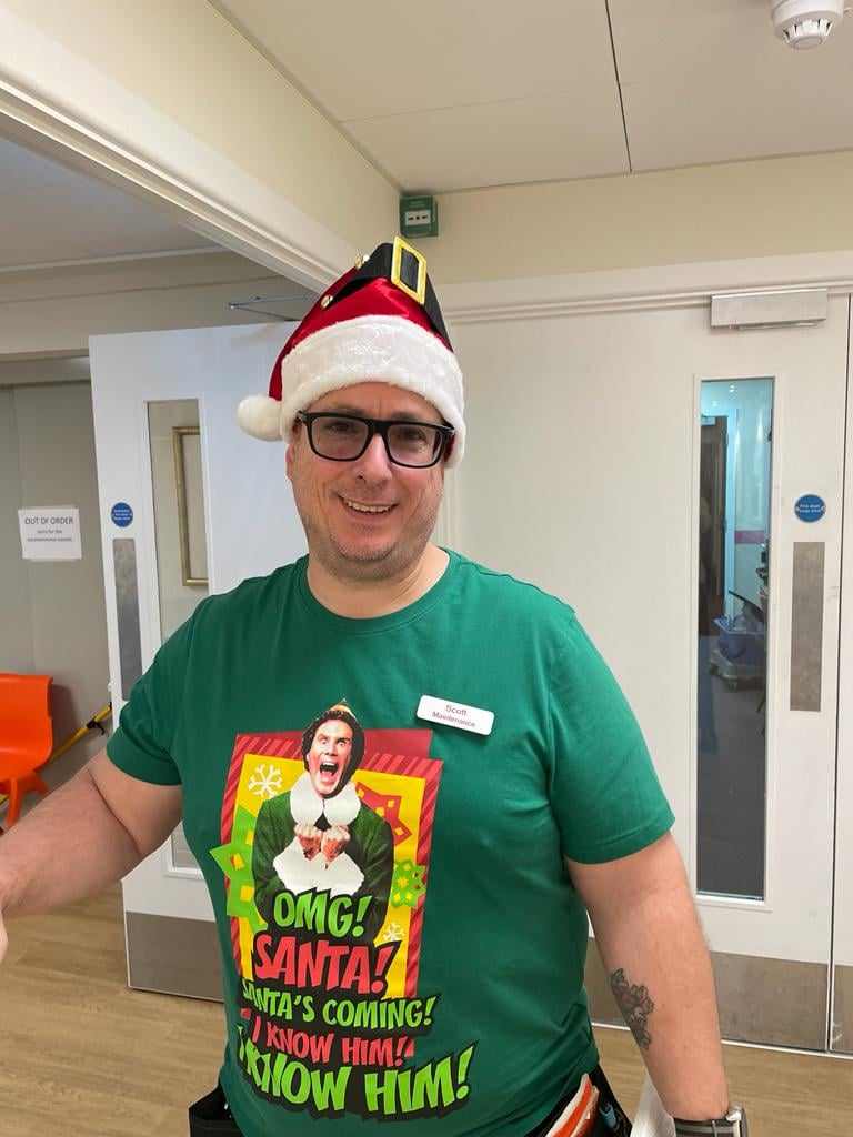 Maintenance staff in Norwich care home Corton House wearing an "Elf" t-shirt