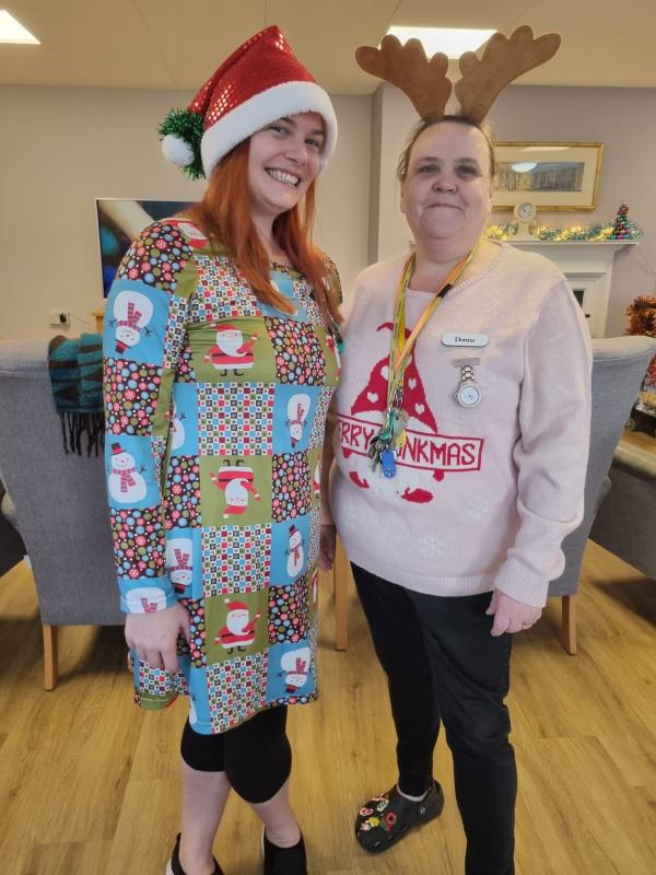 Staff members wear Christmas outfits on Christmas day in Norfolk Care Home
